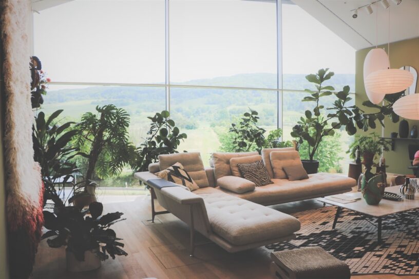 Bright, modern living room in a smart home, illustrating the future of AI-integrated living spaces for Charlotte home buyers.